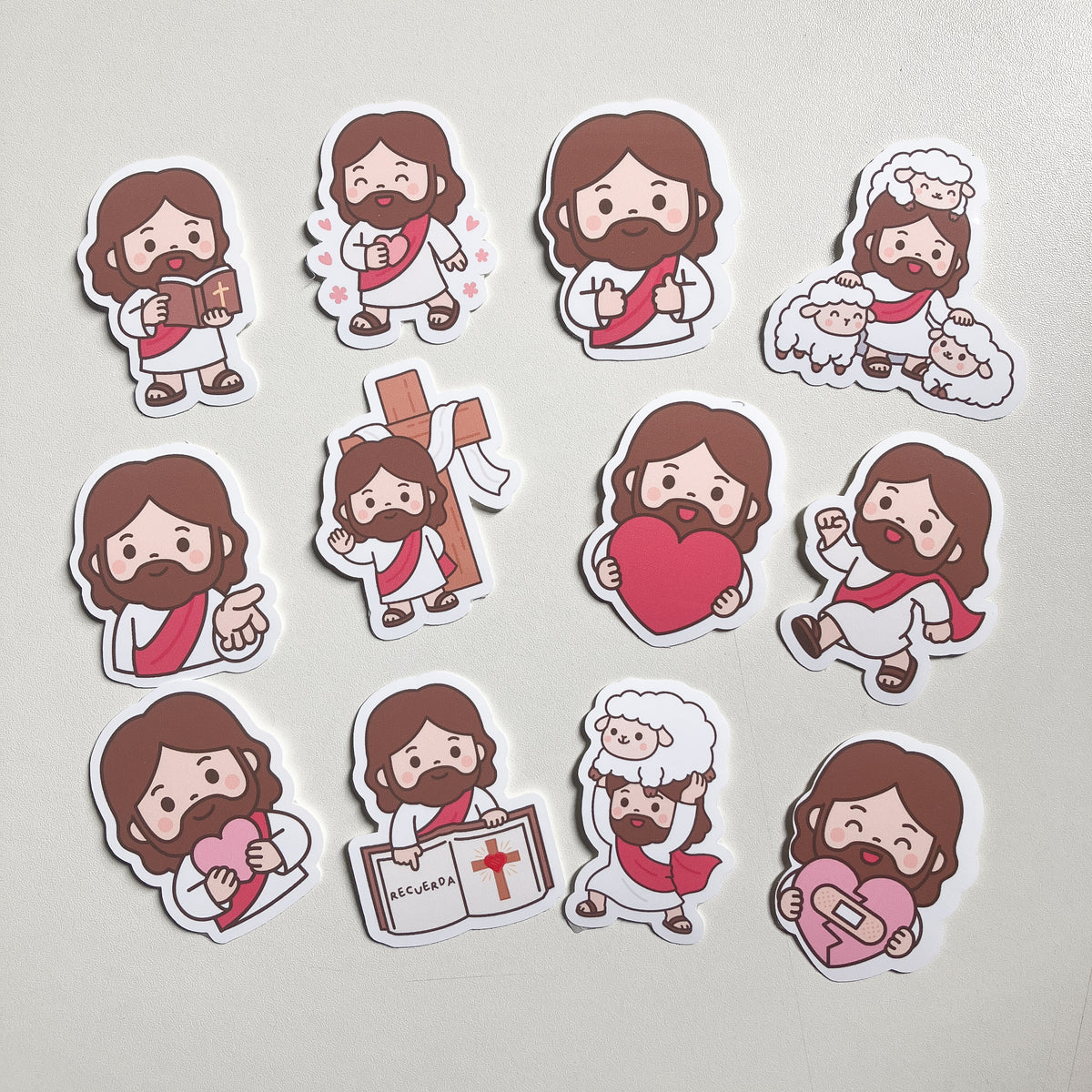 Los 12 stickers ilustrados de Jesús del set, impresos en vinilo resistente al agua