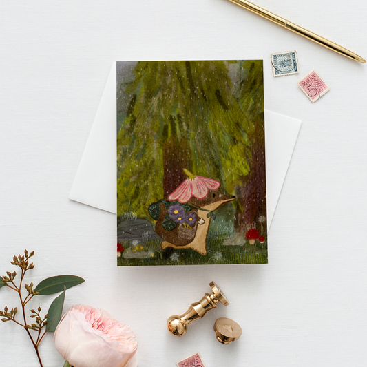 Postal Ilustrada, tarjeta 10x15 cm. Martita en la lluvia